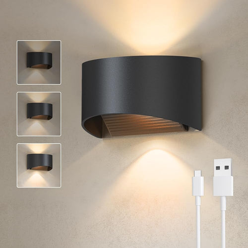 1218. Two curved metal wall lamps